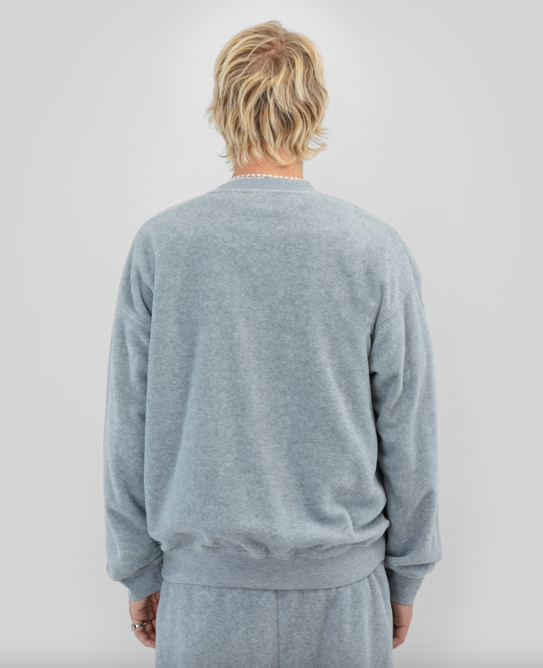 BEYOND MEDALS FLEECE CREWNECK