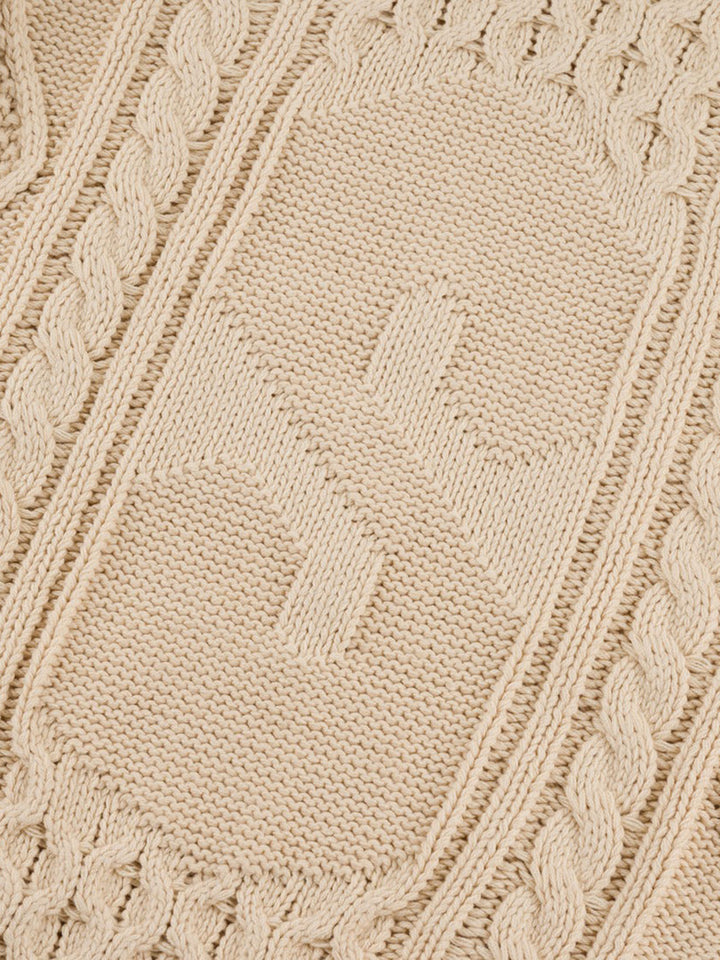 SOUVENIR ENGINEERED CABLE KNIT SWEATER