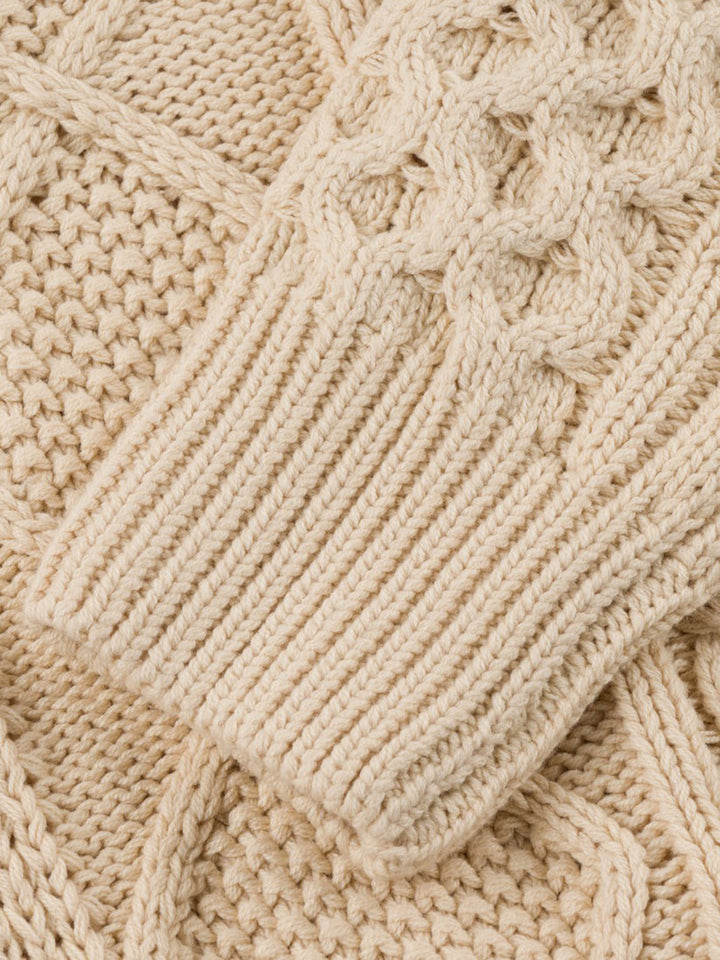 SOUVENIR ENGINEERED CABLE KNIT SWEATER