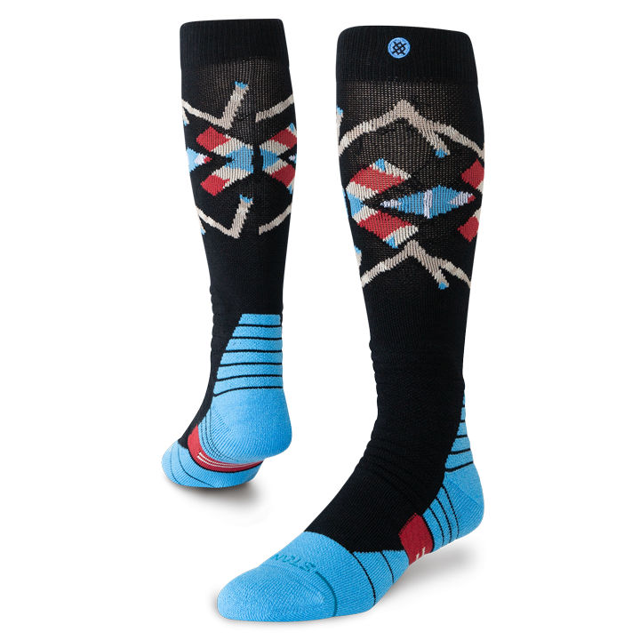 Bas de neige Stance Breaker Mid Poly Black, motif géométrique et pieds bleus — paire présentée en volume.