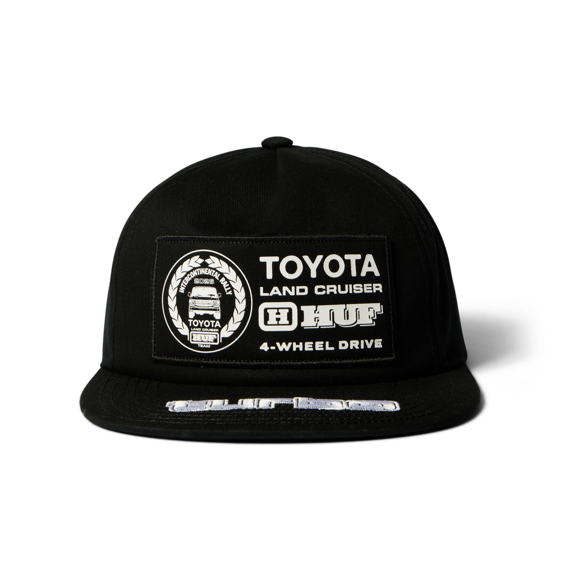 Casquette HUF x Toyota Land Cruiser Rally Snapback noire — détail de l'écusson frontal.