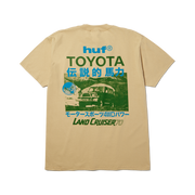 T-shirt HUF x Toyota Land Cruiser 70 Sand, couleur sable — vue de dos avec grand imprimé vert et bleu.